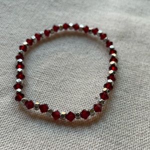 Red & silver holiday rush bracelet.